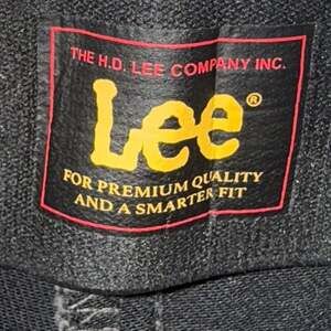 Vintage 1990s Lee Black Pull-On Flare Denim Pants | High Rise